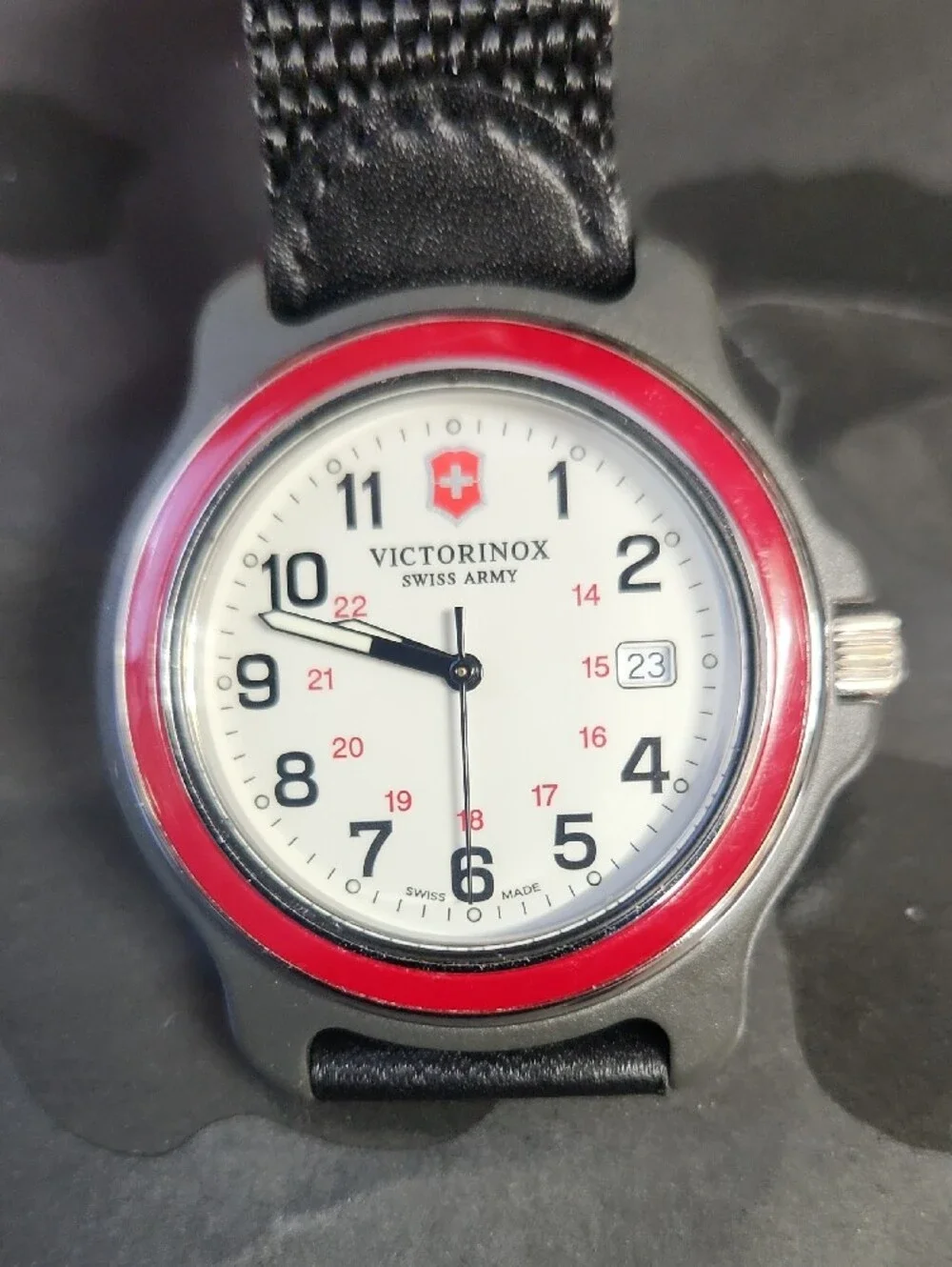 Victorinox Red-Bezel Silver Field Watch with Black Strap